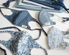 Load image into Gallery viewer, Blue paisley face covering with blue inside