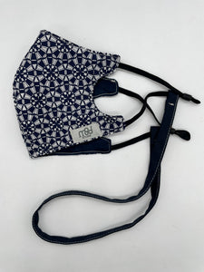 Blue geometric face covering with string